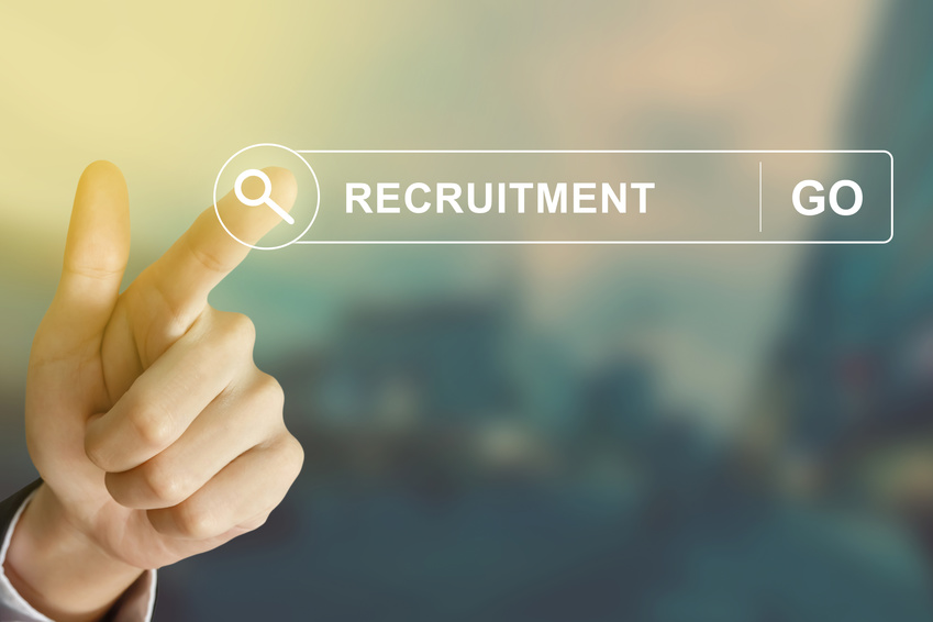 business hand clicking recruitment button on search toolbar with vintage style effect
